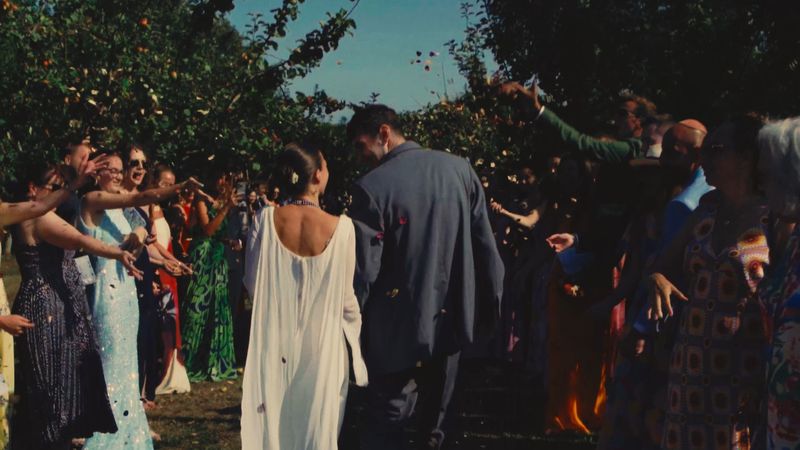 Leaving the ceremony through the orchard